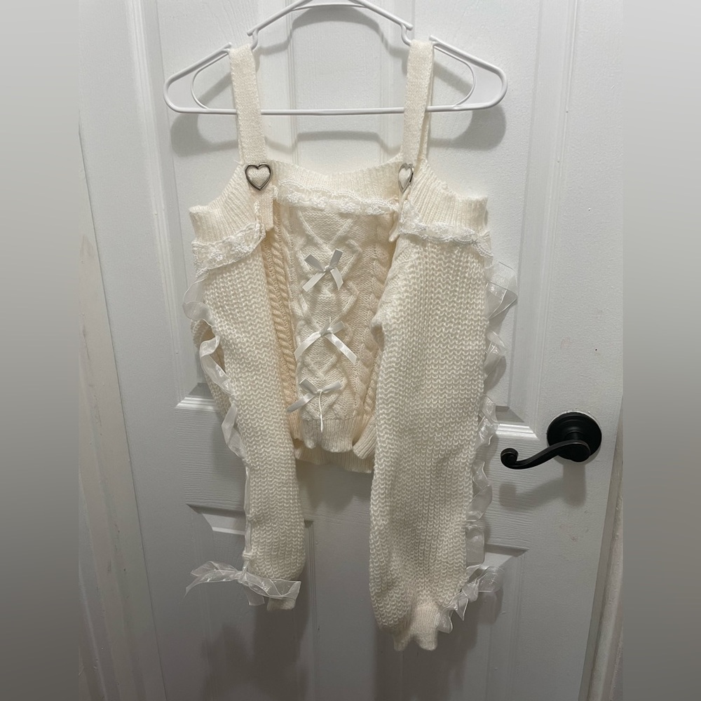 Brand New with tags adorable sweater size XL 12